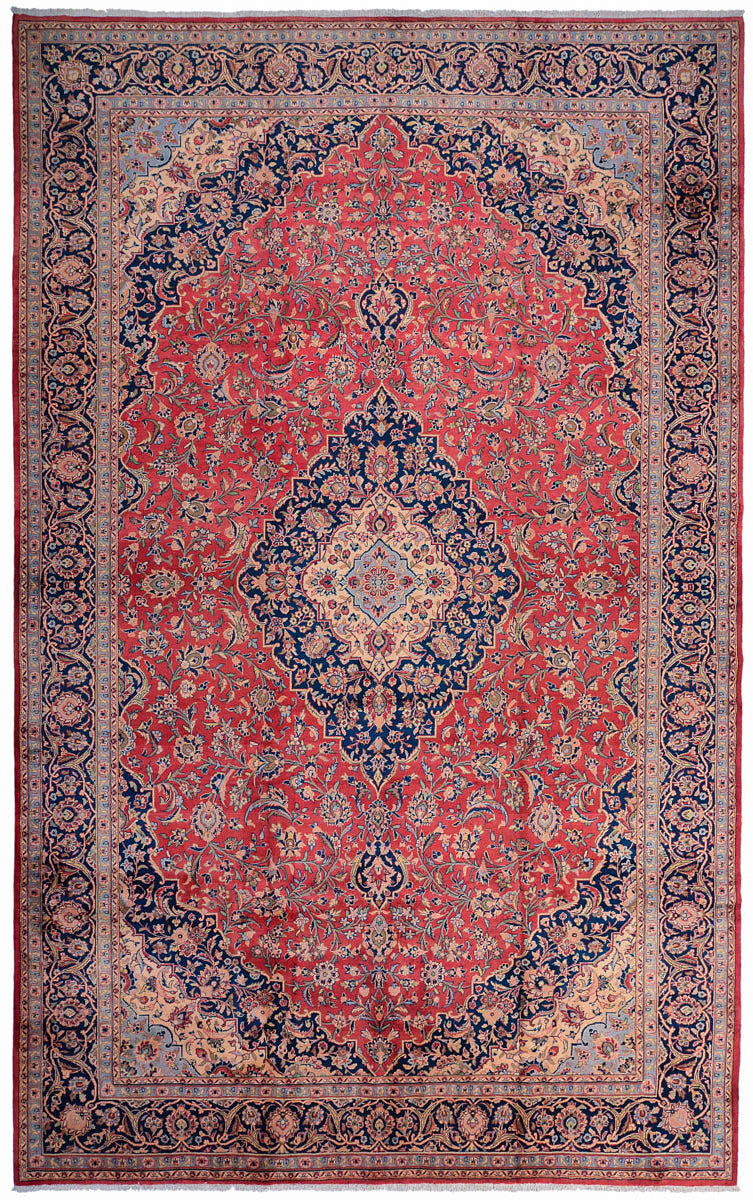 Decorative Persian Kashan red and blue patterned rug with intricate designs and shah abbas motifs