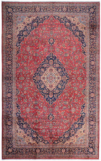 Decorative Persian Kashan red and blue patterned rug with intricate designs and shah abbas motifs