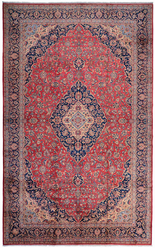 Decorative Persian Kashan red and blue patterned rug with intricate designs and shah abbas motifs