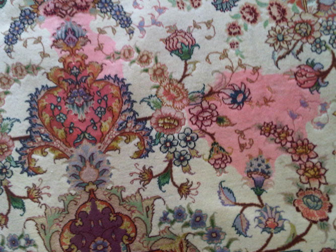 Persian Tabriz wool and silk rug with wine stain or colour run/dye migration for cleaning