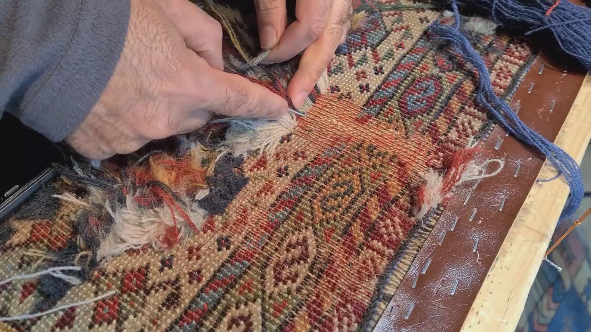 Load video: Rug repair and re-knotting of a handmade rug at Little-Persia in Glasgow